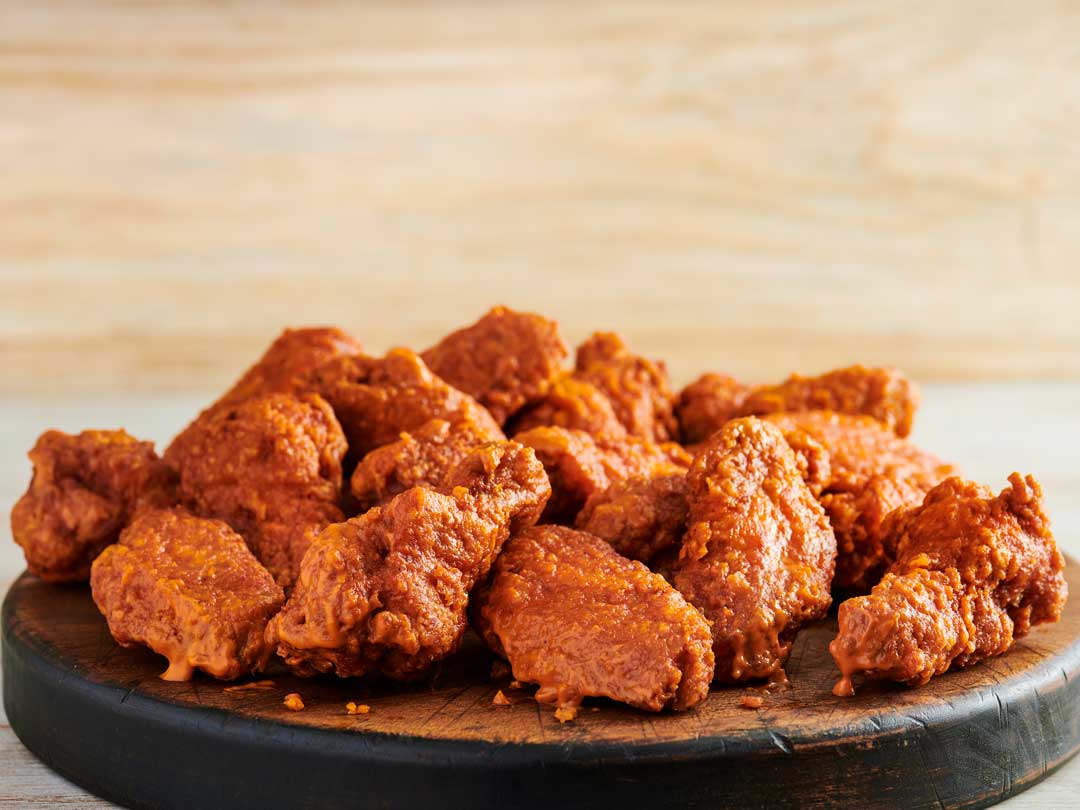 https://originalhooters.com/wp-content/uploads/2020/09/hooters_menu_wings_breaded_hot.jpg